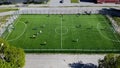 Classical stadium from birds eye view. Drone view. Green Football soccer field