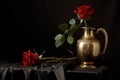 Classical still life with roses in a messing vase