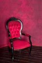 Classical style armchair. Antique wood sofa couch in vintage room. Royalty Free Stock Photo
