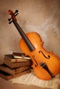 Classical violin and old books Royalty Free Stock Photo