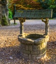 Classical water well, medieval looking architecture, historical decorations Royalty Free Stock Photo