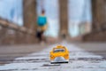 Classical yellow taxi model on an empty Brooklyn Bridge during lockdown in New York, because of the pandemic Royalty Free Stock Photo