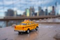 Classical yellow taxi model on an empty Brooklyn Bridge during lockdown in New York, because of the pandemic Royalty Free Stock Photo