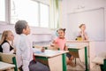 School children participating actively in class. Education, learning, high school Royalty Free Stock Photo