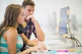 Classmates doing an assignment together in the computer room