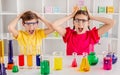 Classmates screaming during chemistry lesson Royalty Free Stock Photo