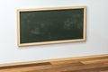 A classroom with a blackboard in the front of the room, 3d rendering Royalty Free Stock Photo