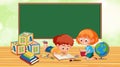 Classroom with boy and girl reading book Royalty Free Stock Photo