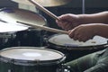 the classroom Close-up of musician playing drums on stage Selectable focus Royalty Free Stock Photo
