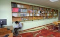 Classroom of the medrese. Muslim boy sitting at a school desk, reading book. Islamic culture centre, Kyiv, Ukraine