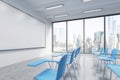 A classroom or presentation room in a modern university or fancy office. Blue chairs Royalty Free Stock Photo