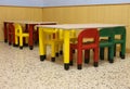 Classroom of a school with colorful chairs and small tables Royalty Free Stock Photo