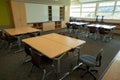 Classroom with empty whiteboard and seats neatly organized with no students