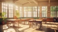 classroom with sunlight streaming through large windows, highlighting empty desks and chairs