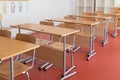 Classroom with wooden desks and chairs
