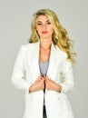 Classy and chic. Girl confident business lady formal white jacket and denim jeans. Gorgeous and stylish. Impeccable