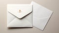 A classy and elegant image of two white envelopes on a beige background. The envelope on the left is a square flap Royalty Free Stock Photo