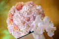 Classy floral arrangement in a pastel round bouquet featuring pink hydrangea roses and orchids Royalty Free Stock Photo