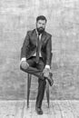 Classy style is timeless. Stylish businessman sit on chair. Bearded man in formal style. Professional wardrobe. Business