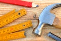 Claw hammer, carpenter meter, pencil and chisel Royalty Free Stock Photo