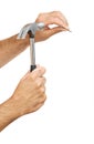 Claw hammer and hand with nail Royalty Free Stock Photo