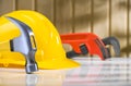 Claw hammer with hardhat and ajustable spanner Royalty Free Stock Photo