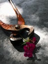 Claw hammer, pliers, and a flower. Set of different tools on metal background with flowers Royalty Free Stock Photo