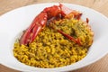 Clawed Lobster with yellow rice Royalty Free Stock Photo