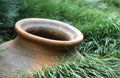 Clay amphora in grass field Royalty Free Stock Photo