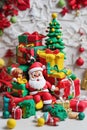 Clay art of a christmas showing a santa claus around xmas ornaments Royalty Free Stock Photo