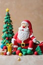 Clay art of a christmas showing a santa claus around xmas ornaments Royalty Free Stock Photo