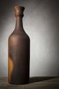 Clay bottle with wine Royalty Free Stock Photo