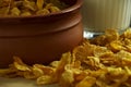 Clay bowl of cornflakes with glass of milk close up Royalty Free Stock Photo