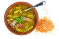 Clay bowl with lentil soup and smoked pork ribs isolated Royalty Free Stock Photo