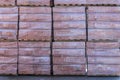 Clay brick's pallet at the storage yard. pallets with bricks in the building store. Racks with brick. Masonry, stonework.