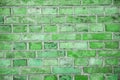 Bright green clay brick wall, vintage look, detailed view Royalty Free Stock Photo