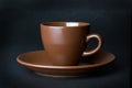 Clay (ceramic) cup on dark