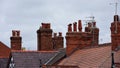 Clay chimney pots on rooftops Royalty Free Stock Photo