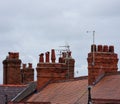 Clay chimney pots on rooftops Royalty Free Stock Photo