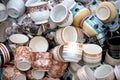 Clay cups randomly arranged for sale