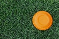 Clay disc flying targets on green grass background ,Clay Pigeon target
