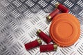 Clay disc flying targets and shotgun bullets on daimond plate background ,Clay Pigeon target game Royalty Free Stock Photo