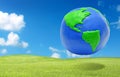 Clay earth over the green grass field eco concept Royalty Free Stock Photo