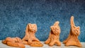 Clay figures. artisan pottery workshop. cats