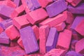 Clay handmade bricks. Bright magenta purple colored Royalty Free Stock Photo