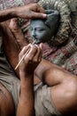 The clay idol maker of Hindu goddess is busy making heads.