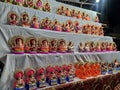 Clay idols for sale during festival of Joy. Decorated Hindu deities.
