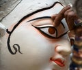 Clay image making,Clay artist,painting eye, Goddess Saraswati ,Kumartuli,Clay image hub,Kolkata,India