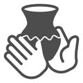 Clay jug with wave pattern in hands solid icon, pottery making concept. Vector graphics. Hands with clay jug, fragile Royalty Free Stock Photo