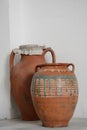Clay jug on wooden background Royalty Free Stock Photo